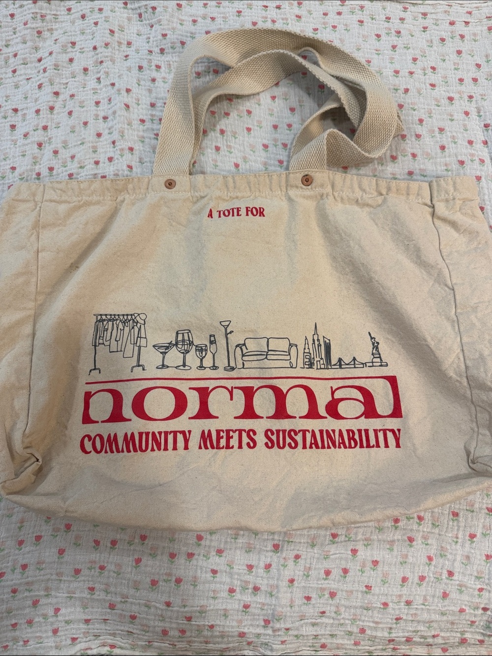 Normal Community Meets Sustainability Canvas Tote - Red Text on Natural